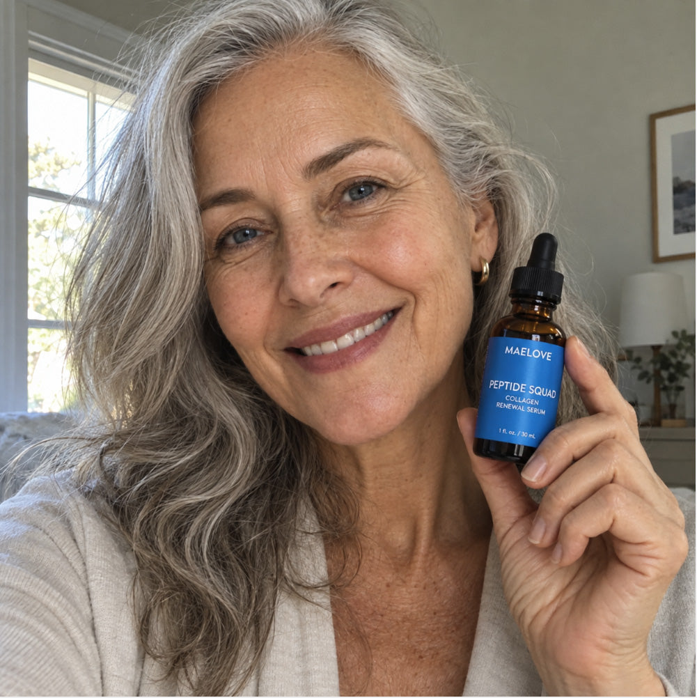 Woman holding a bottle of Maelove Peptide Squad serum